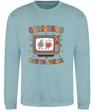 Load image into Gallery viewer, Christmas Movie Junkie Retro Sweatshirt
